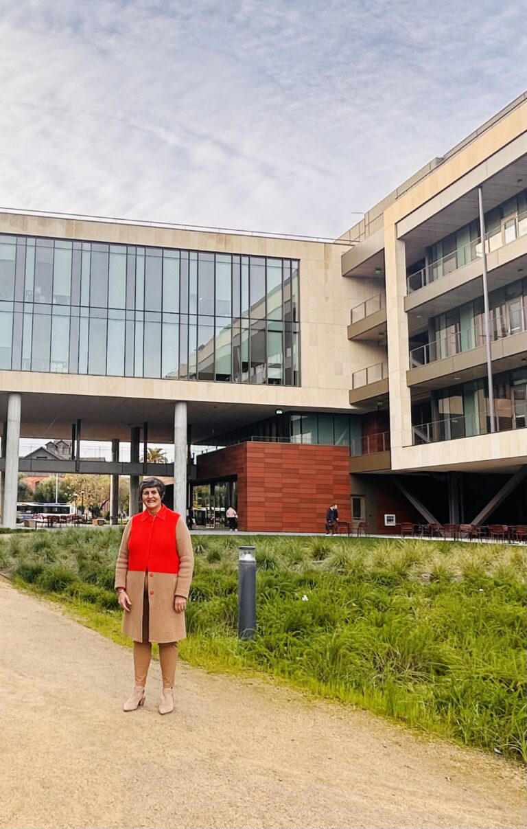 Karen Kearney, head of Stanford Treasury, standing in front of Center for Academic Medicine, a building that was funded by the climate bonds