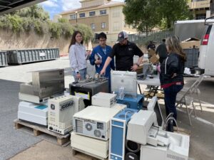 People standing with various pieces of equipment.