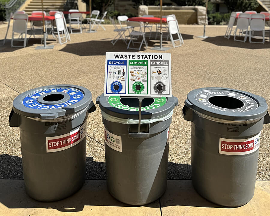 Event services bins: recycle, compost, landfill with sign