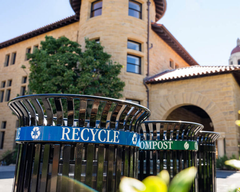 Black recycle and compost bin with Hoover Tower behind