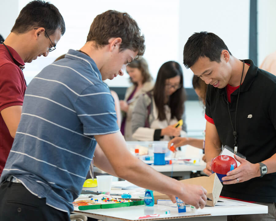 Students working hands on in classroom