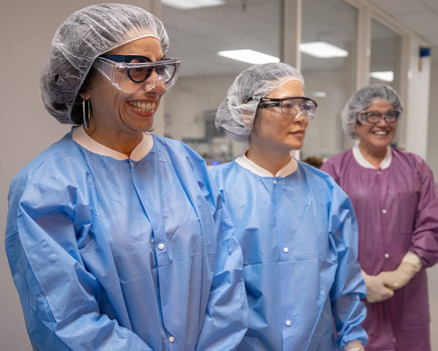 Nicole Solis prepares for a clean room tour