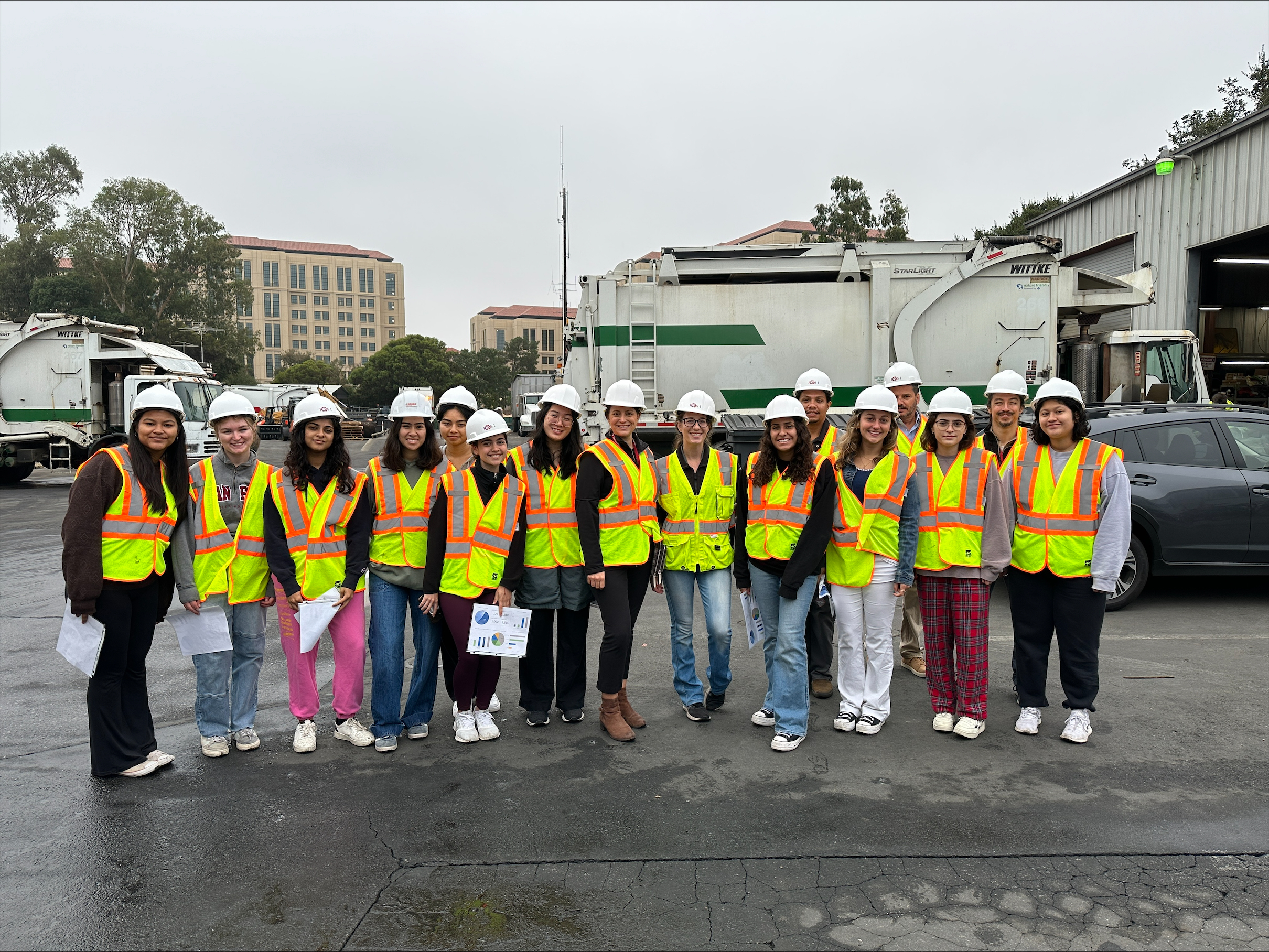 Student intern and fellow group with safety vests at PSSI yard