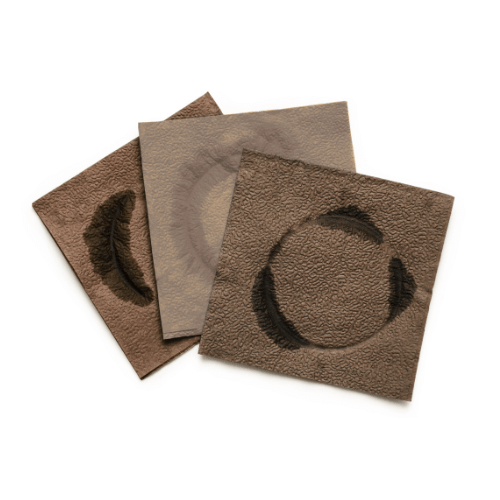 Three brown napkins with water stains